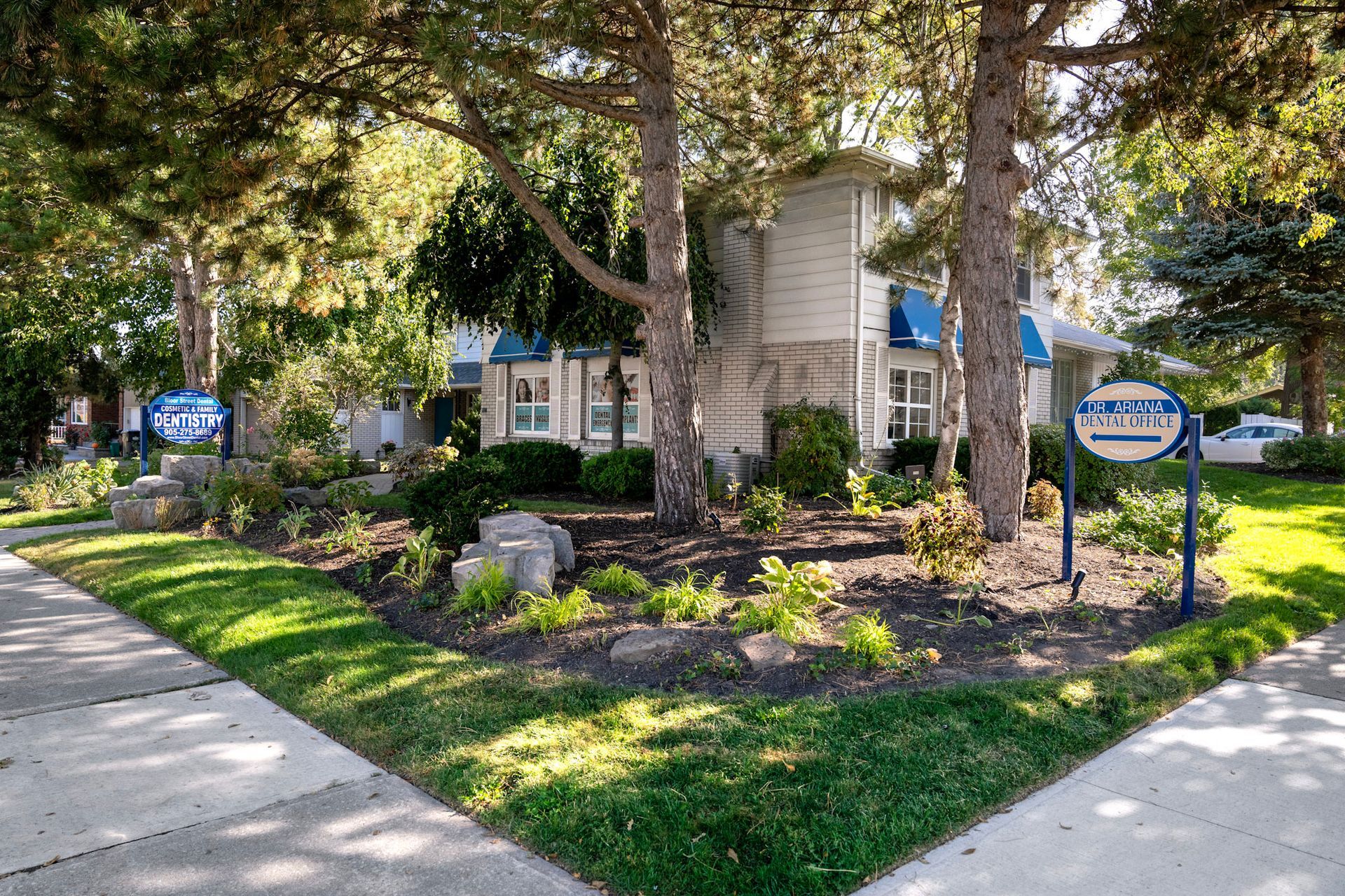 a dental office with a sign that says the grand dental office | Outside a dental office | Bloor Street Dental | Best Family and Cosmetic Dentist In Mississauga For Implants, Braces, and Invisalign