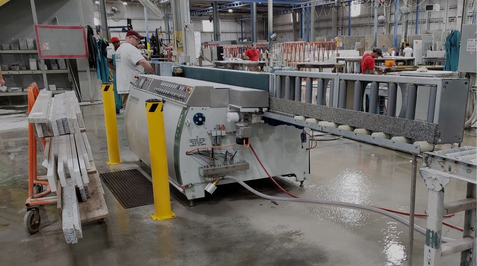 Anderson America industrial woodworking machinery with various processing stations
