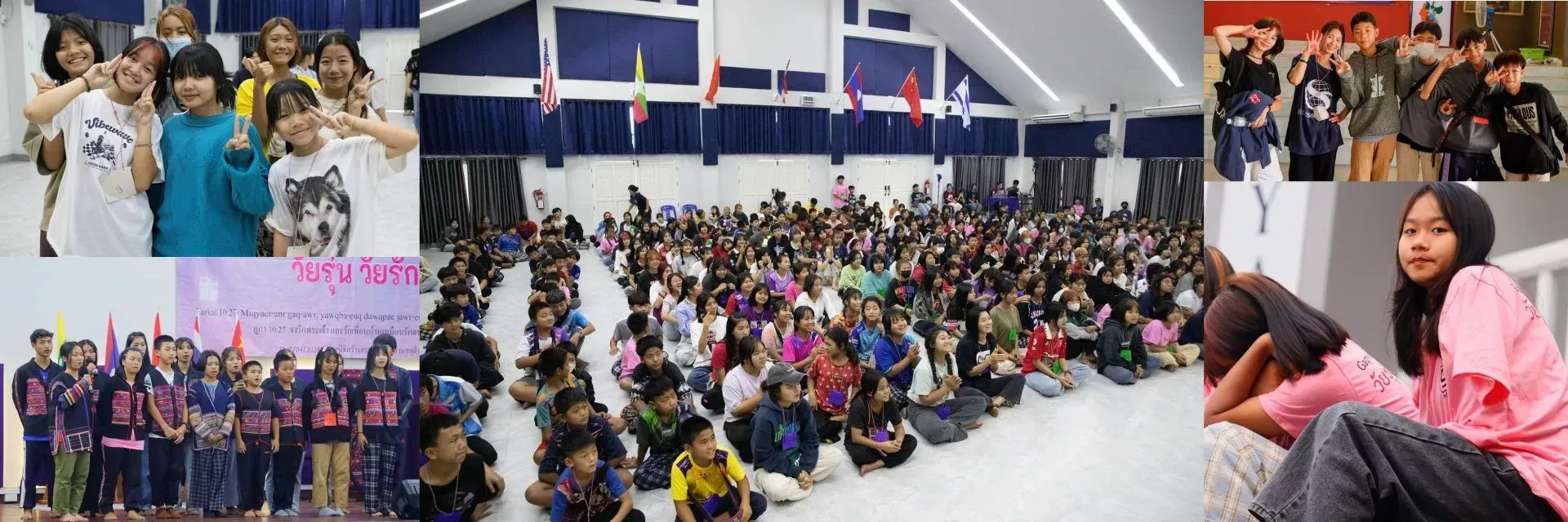 A group of people are sitting in a large room.
