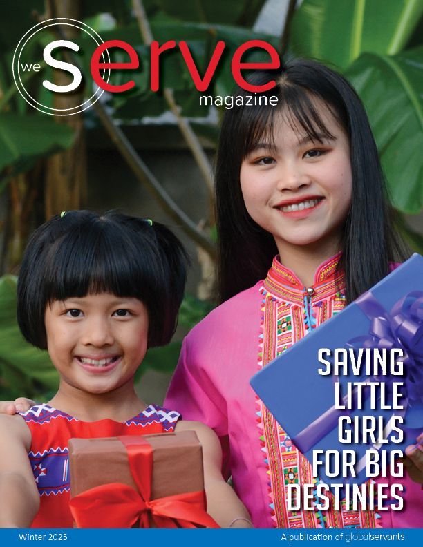 Magazine cover showing two smiling children in colorful traditional dress, with headline: “Saving Little Girls for Big Destinies”