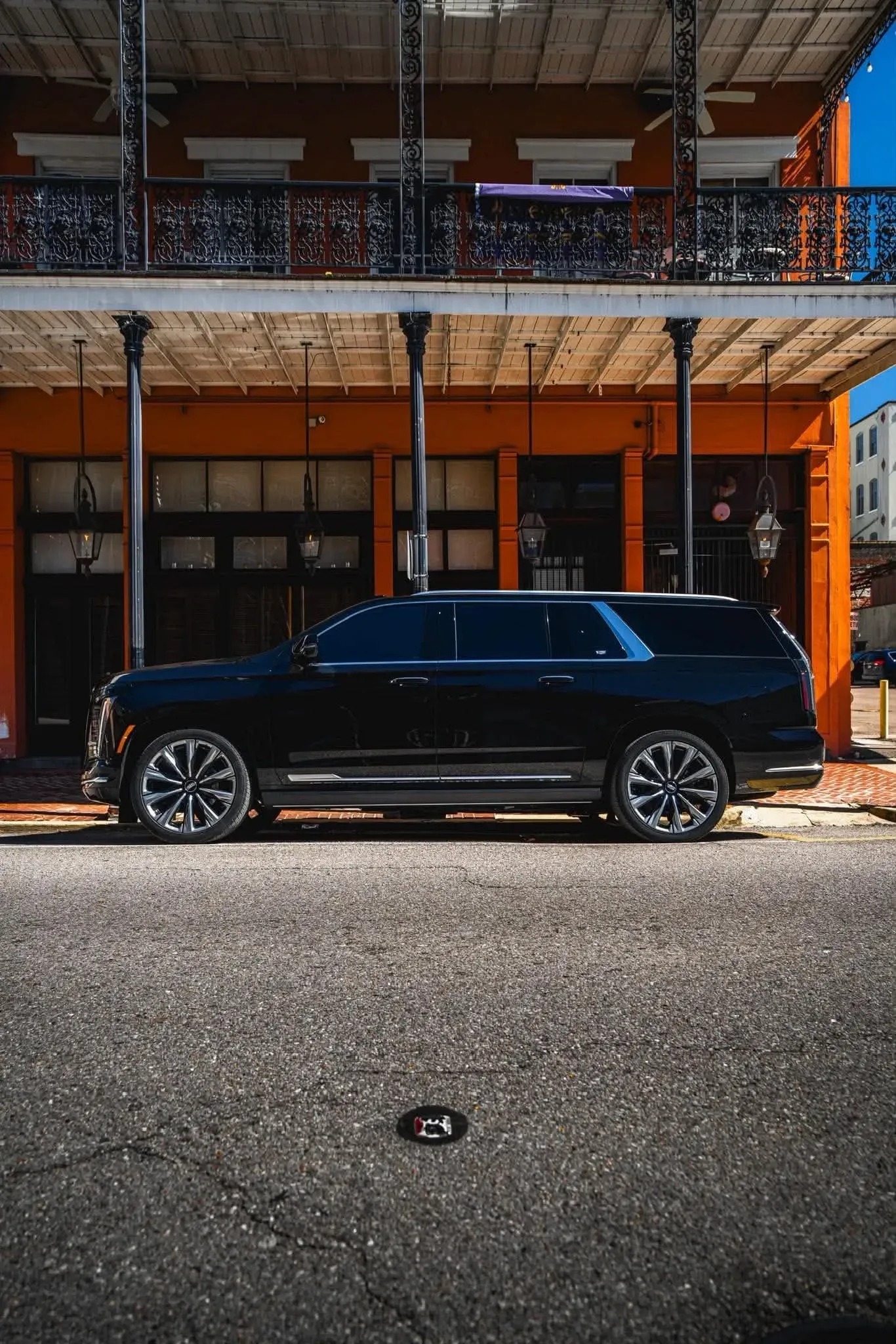 Black Cadillac Escalade luxury SUV chauffeured by Lagniappe Chauffeured Services in New Orleans
