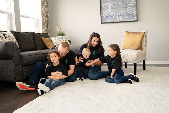 Wiping the Oven — Taylor, MI — Green's Family Cleaning Services