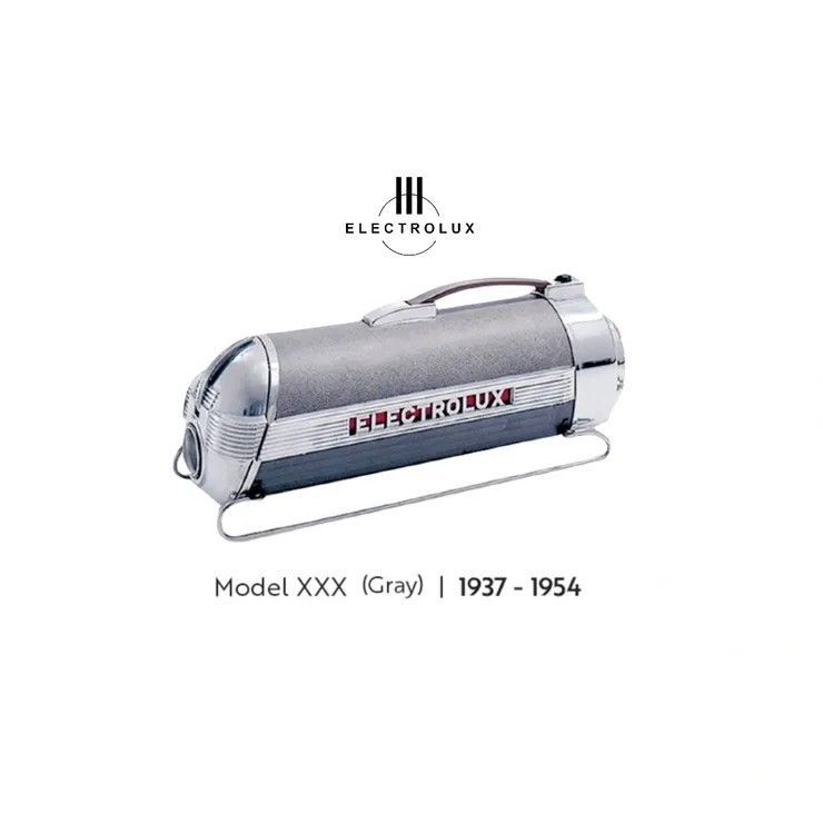 Vintage gray Electrolux vacuum cleaner, Model XXX, with chrome accents and a wire stand, produced from 1937–1954.