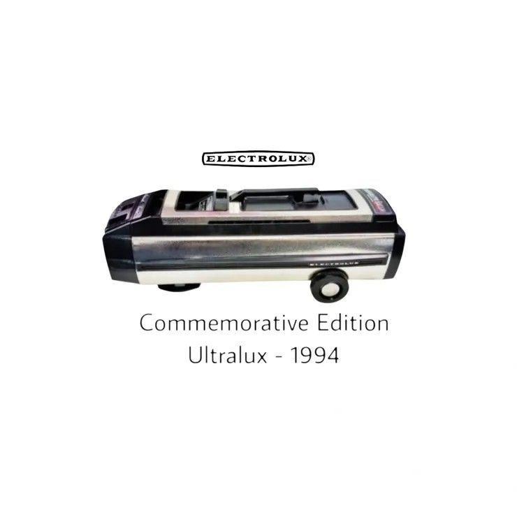 A metallic silver and black Electrolux Ultralux vacuum cleaner, 1994 Commemorative Edition, on a white background.