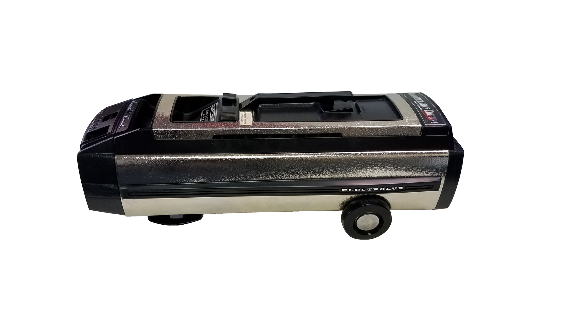 Black and silver toy train car on a white background