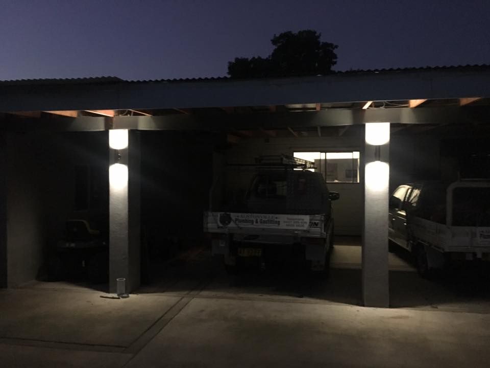 A Jeep is Parked Under a Carport at Night — AH Electrical in West Ballina, NSW