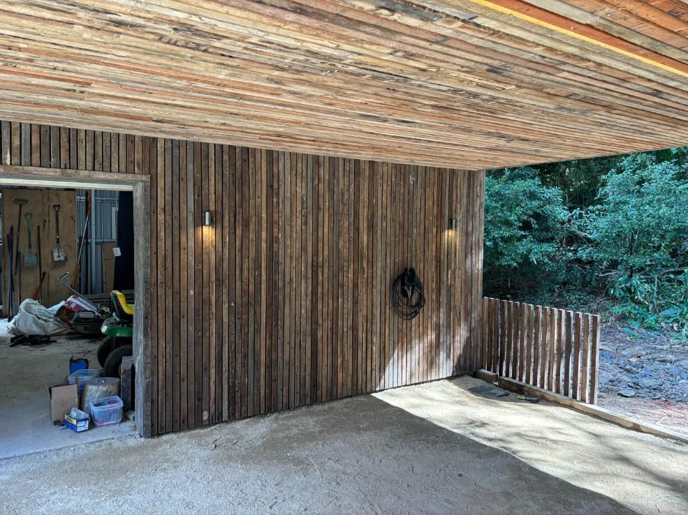 A Garage With A Wooden Ceiling And A Wooden Wall — AH Electrical in Casino, NSW
