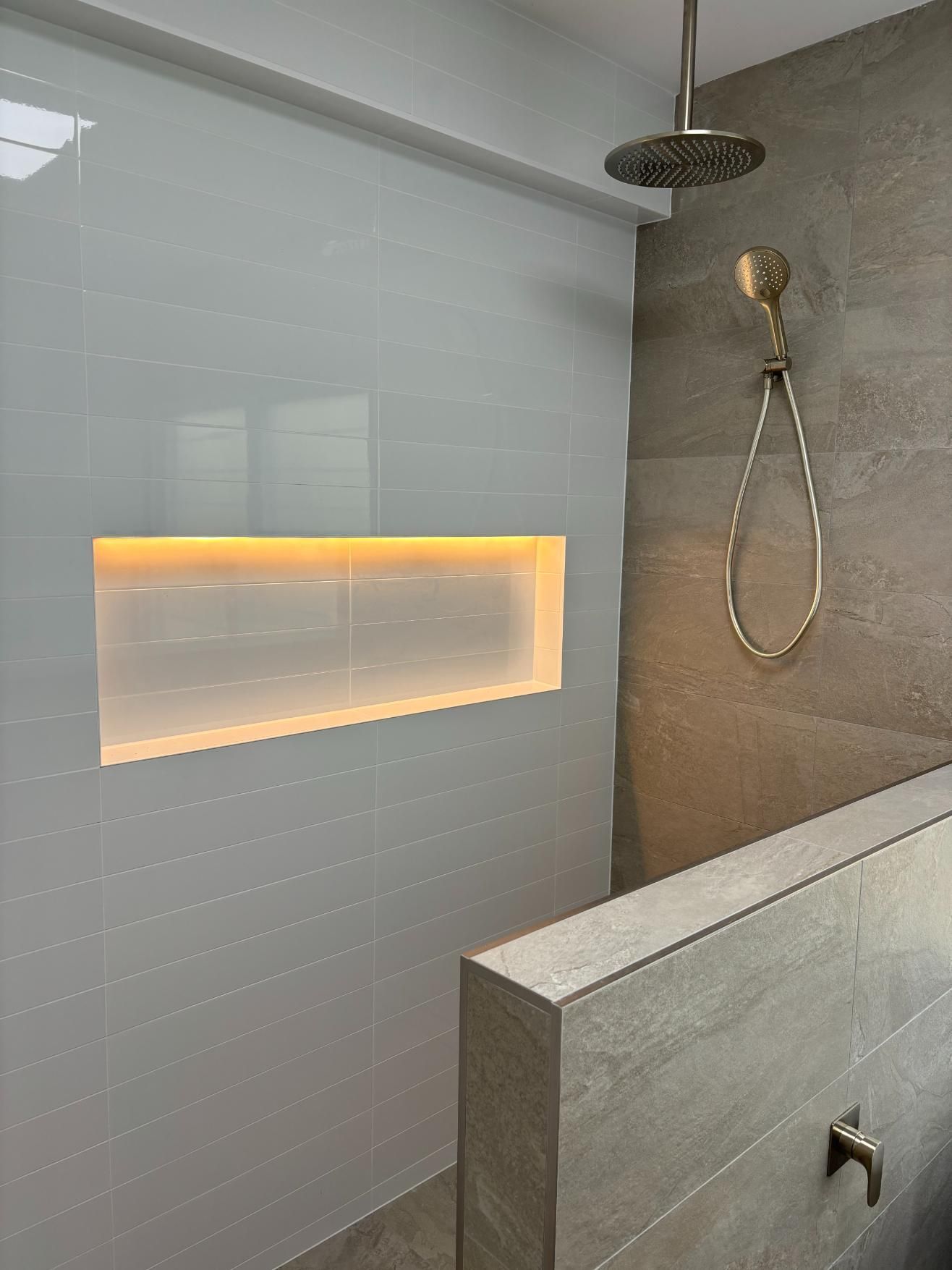 A Bathroom With A Shower Head And A Niche In The Wall — AH Electrical in West Ballina, NSW