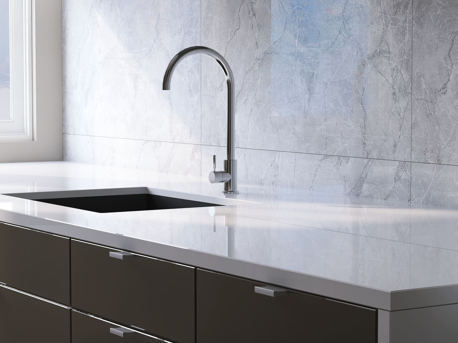A sleek, modern kitchen scene featuring a dark sink, a tall silver faucet, and a white countertop against a marble wall. A sleek, modern kitchen scene featuring a dark sink, a tall silver faucet, and a white countertop against a marble wall.