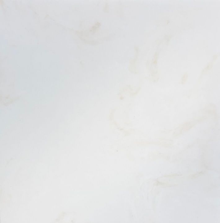 A close-up, top-down view of a textured dark gray stone surface with subtle white and green mineral veining throughout. A close-up, top-down view of a textured dark gray stone surface with subtle white and green mineral veining throughout.