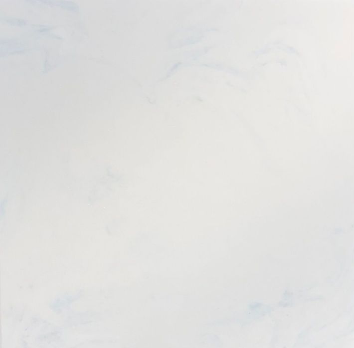 A texture of white marble stone with subtle grey veining running diagonally across the surface. A texture of white marble stone with subtle grey veining running diagonally across the surface.