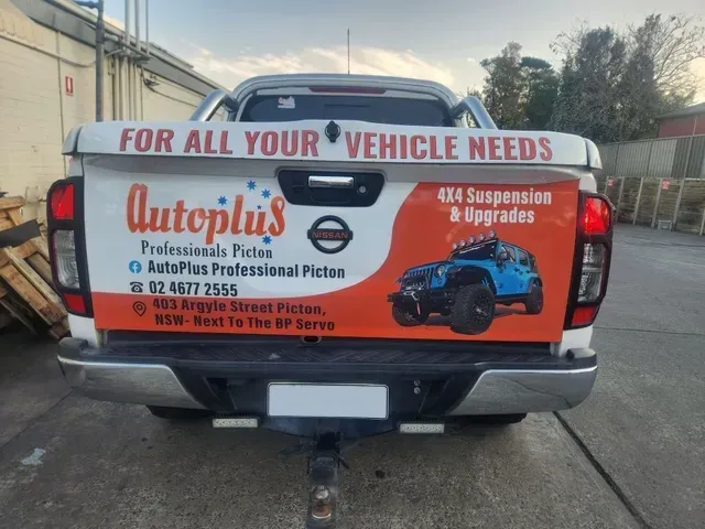 White And Orange Coloured Pick Up Truck — Autoplus Professionals Picton in Picton, NSW