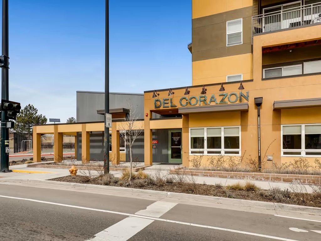 A beige apartment complex named 