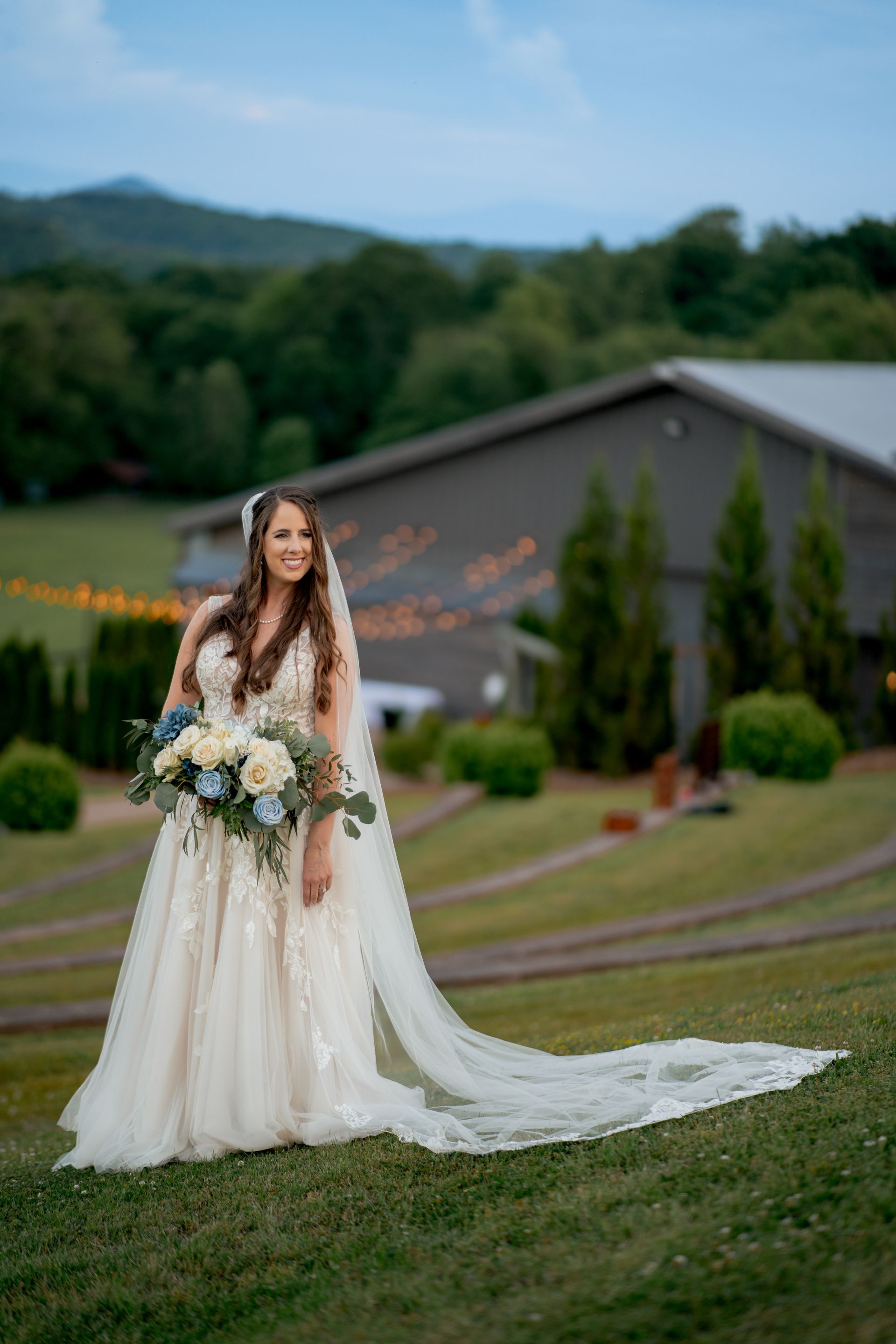Bridal portrait of a Chattanooga bride holding her bouquet at Ocoee Crest. photographed by a Chattanooga Wedding Photographer