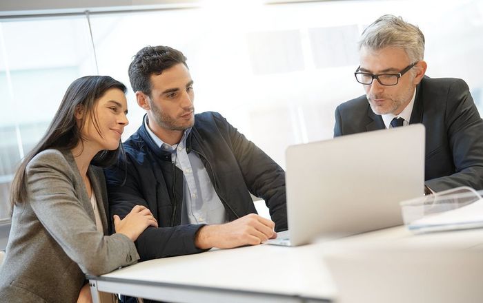 three people in the meeting