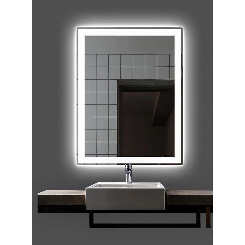 A bathroom with a sink and a mirror with a light on it.