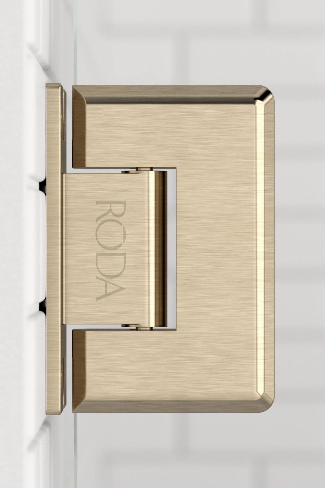 A close up of a door hinge on a white wall.