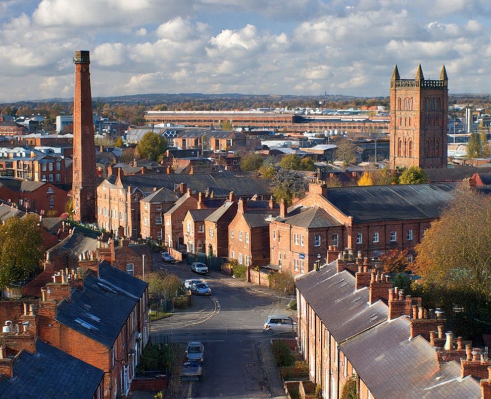 Derby rooftops with the cathedral tower and streets of red-brick terraced houses