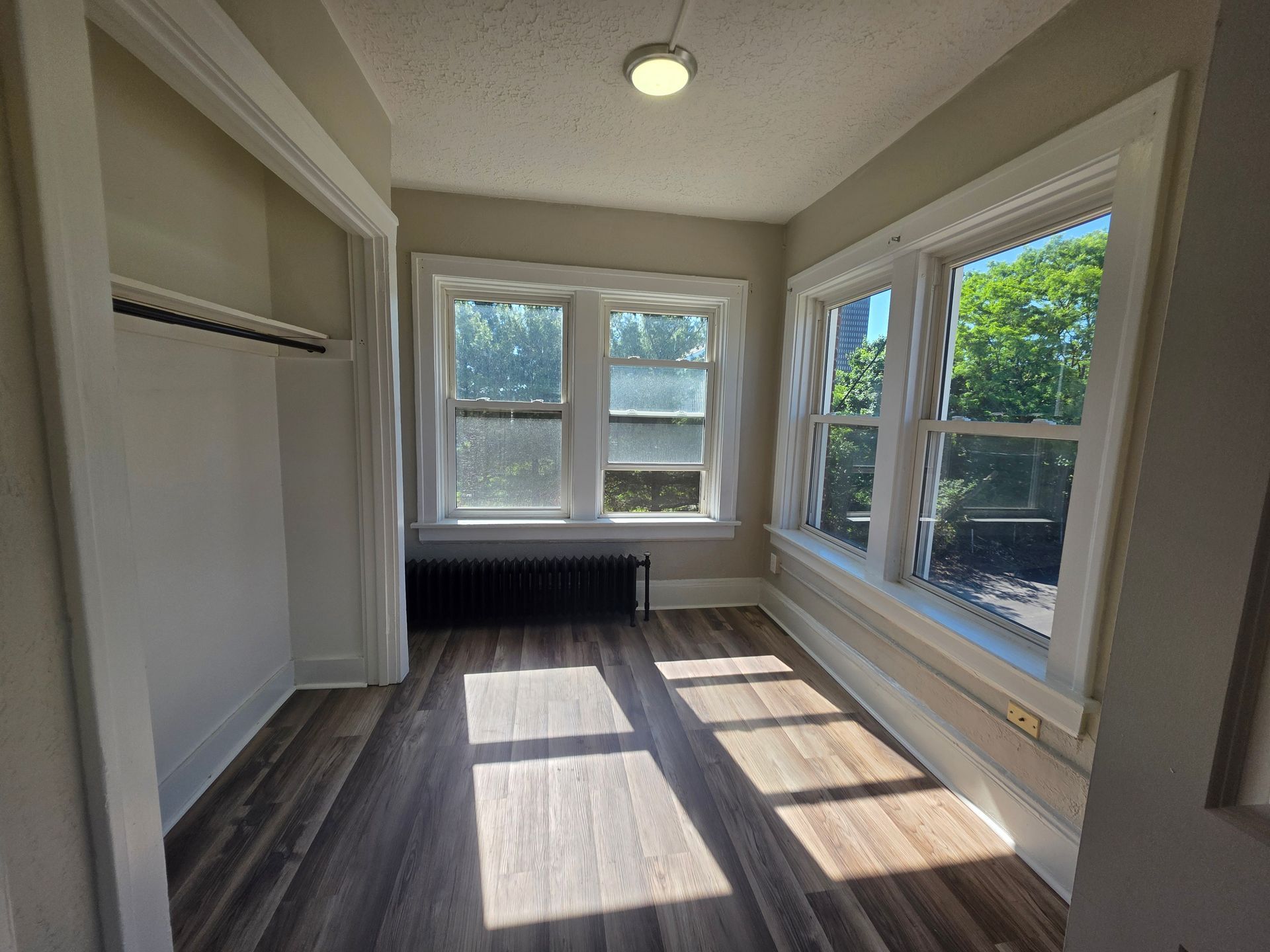 Second bedroom interior layout in a pet-friendly apartment for rent in Akron 44302.