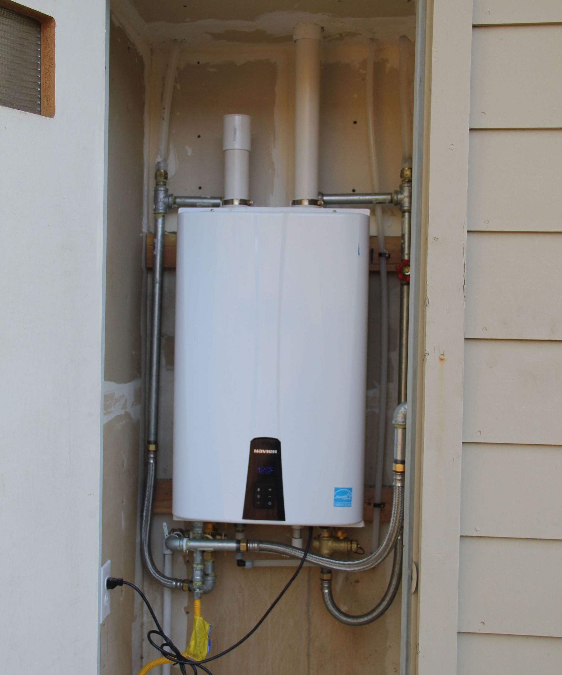 HVAC tech working in house
