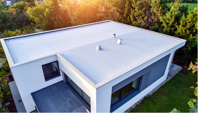 Residential white TPO flat roof on a modern Pennsylvania home