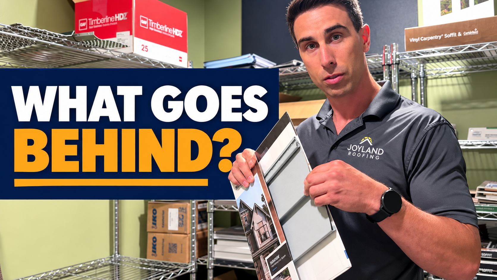 Man holding a black and white binder in a warehouse aisle with bold text: “WHAT GOES BEHIND?”