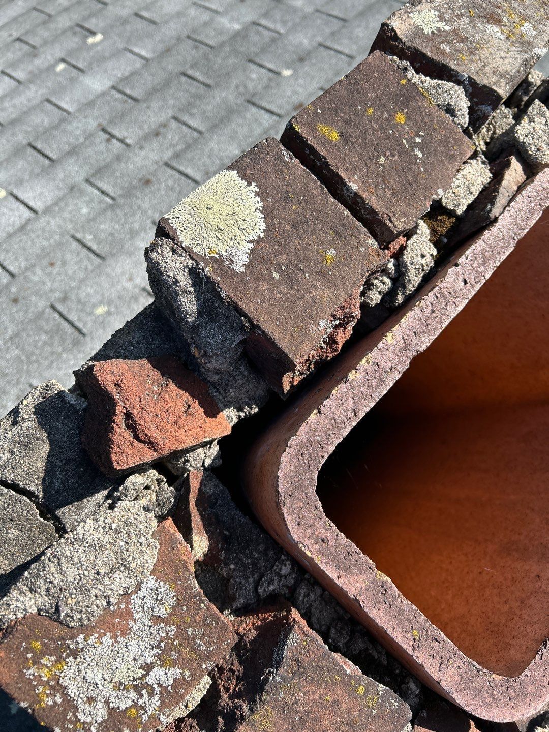 Deteriorated chimney bricks identified during a roof inspection on Annabeth Road in Oley, PA.