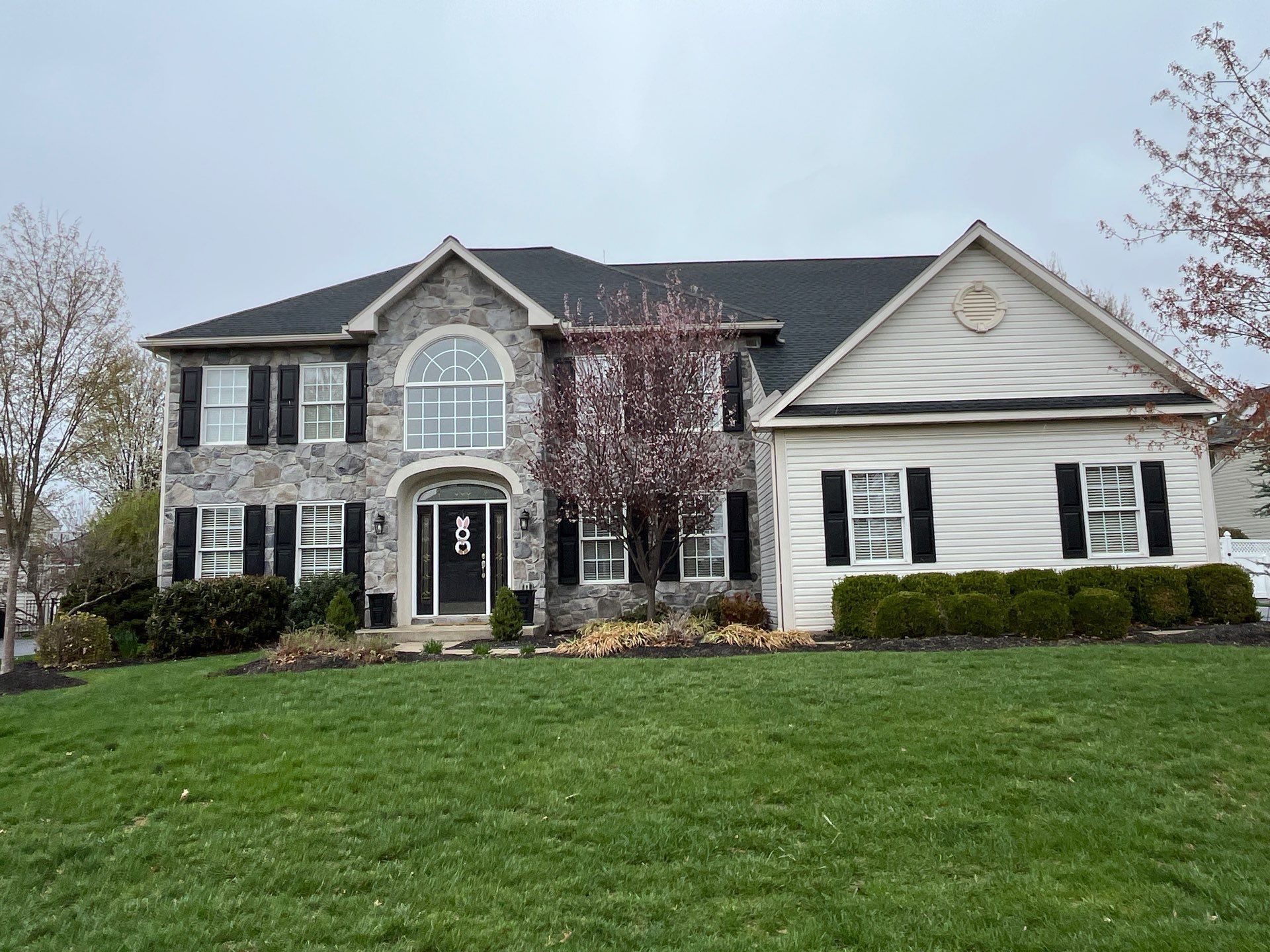 Completed architectural asphalt shingle roof replacement on a two-story home on Carmina Drive in Sinking Spring, PA.