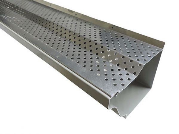 Perforated silver metal drainage channel with raised sides and a slotted surface