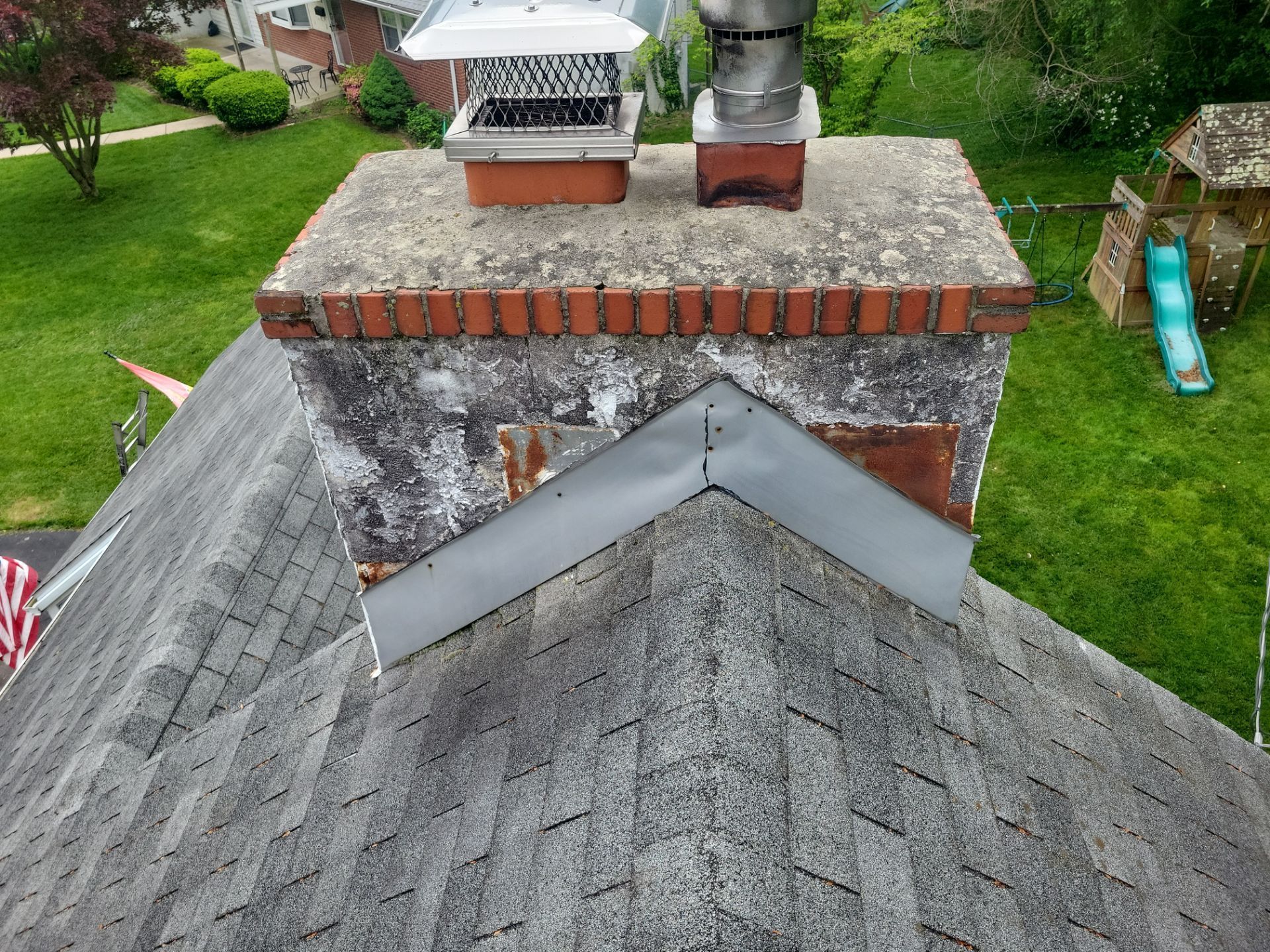 Chimney and roof flashing repair on Leslie Lane