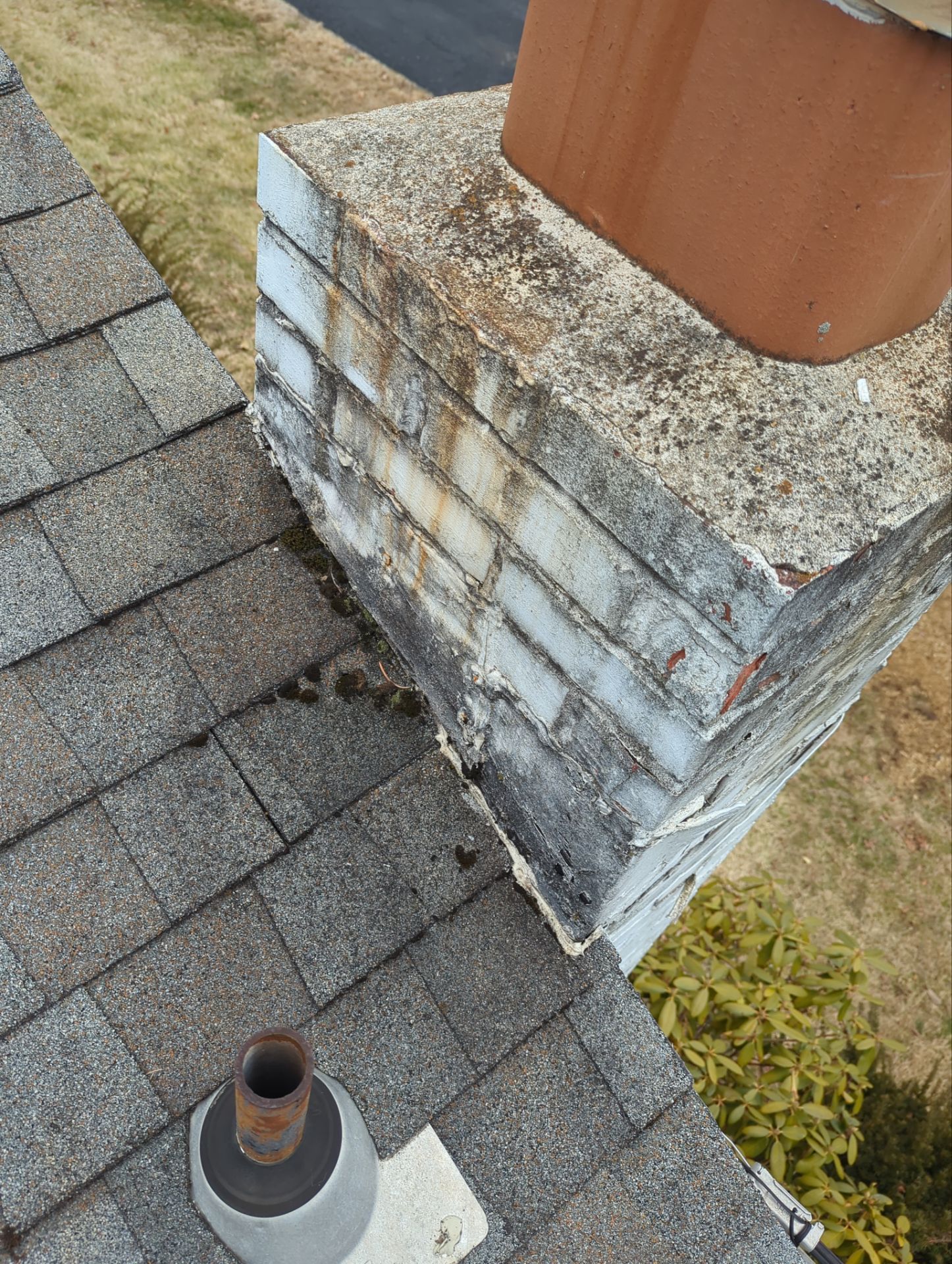 Chimney flashing and asphalt shingle roof repair completed on a home along Coolidge Street in New Cumberland, PA.