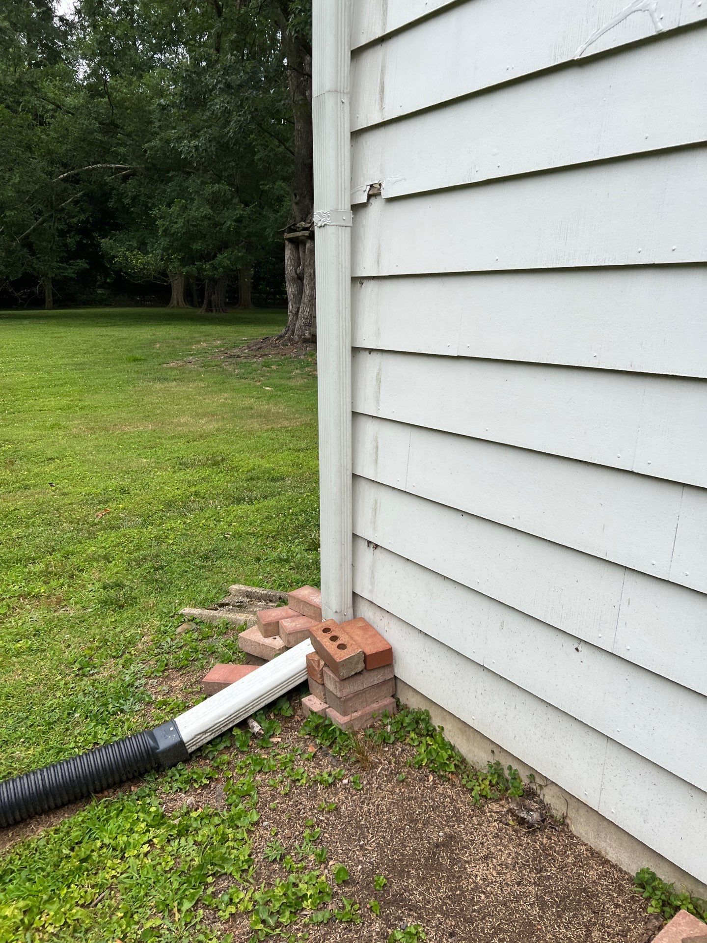 Downspout repair and drainage correction on Edward Jennings Road in Glen Mills PA
