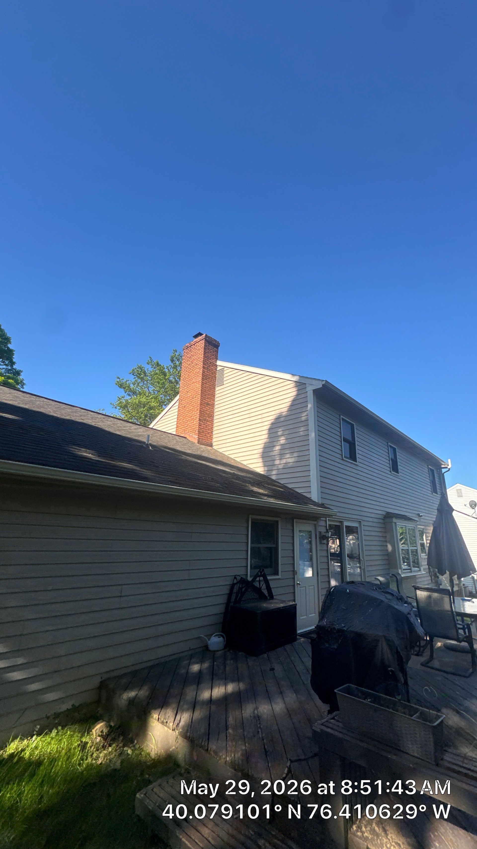 Rear view of a home on Eastside Drive in Landisville, PA during a professional roof inspection.