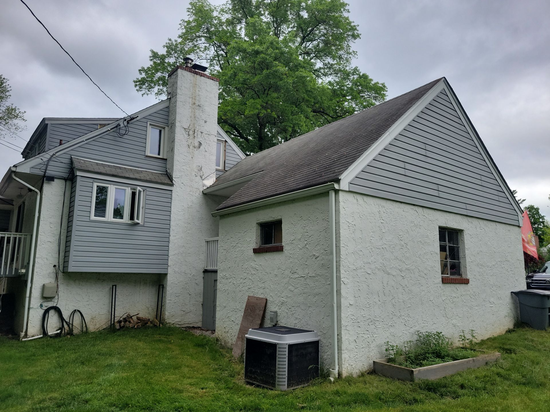 Residential roof and dormer roofing project on Leslie Lane