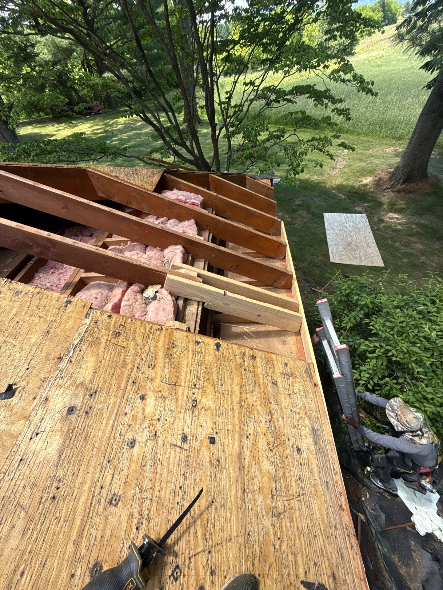 Roof deck replacement in progress during a residential roof replacement on Faust Road in Sinking Spring, PA by Joyland Roofing.