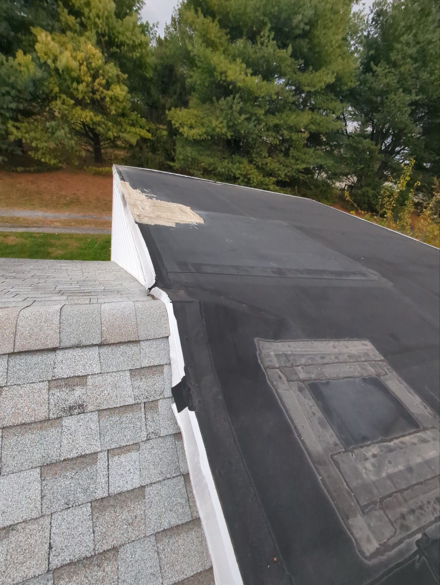 Flat roof replacement with new membrane roofing system on a residential property in Wrightsville, PA.