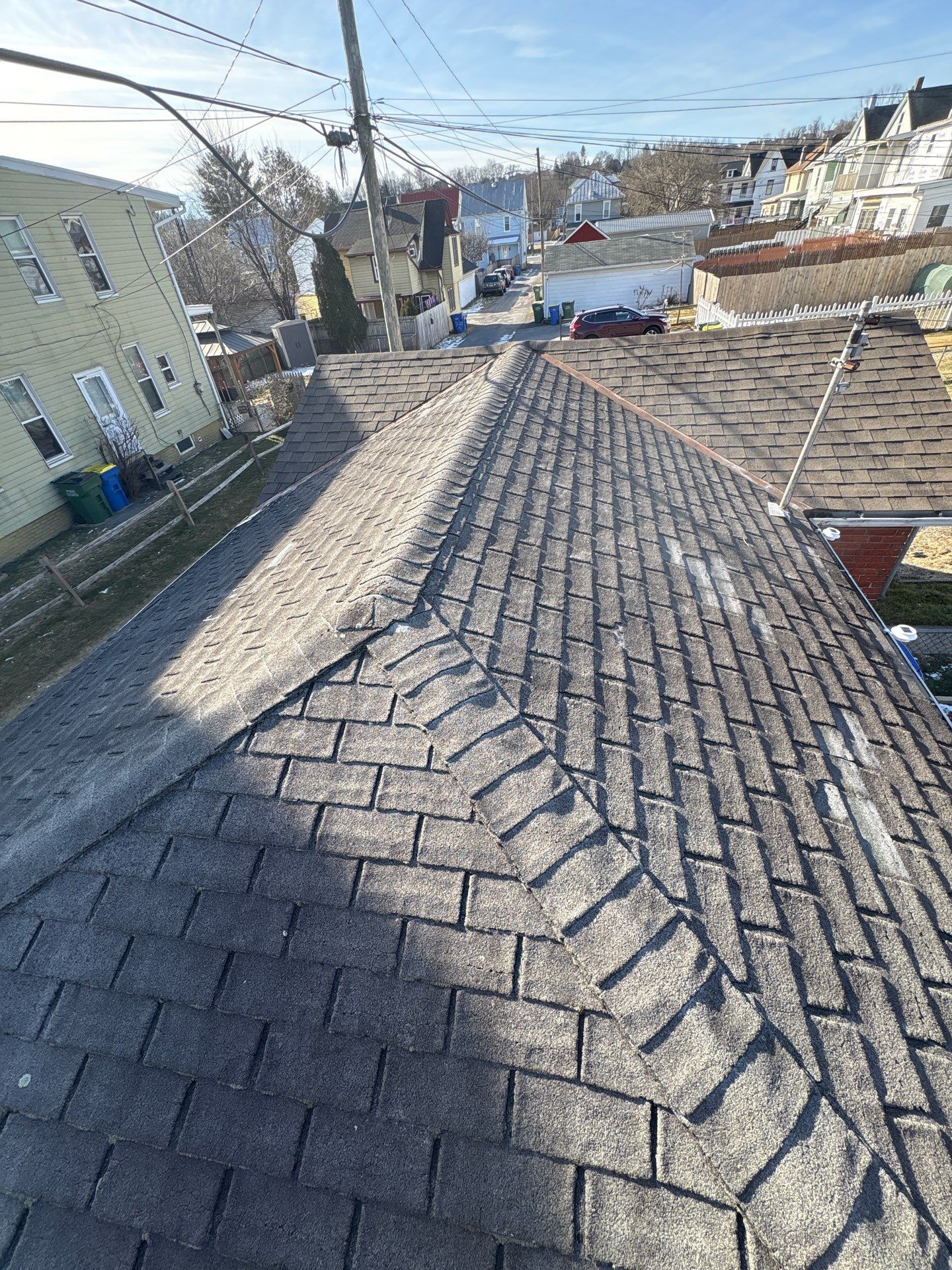 Asphalt shingle roof replacement completed on a home along Fourth Street in New Cumberland, PA by Joyland Roofing.