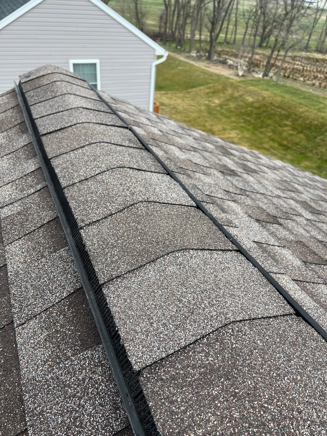 New asphalt shingle roof with ridge vent installed on a home in Gable Drive, Myerstown, PA.