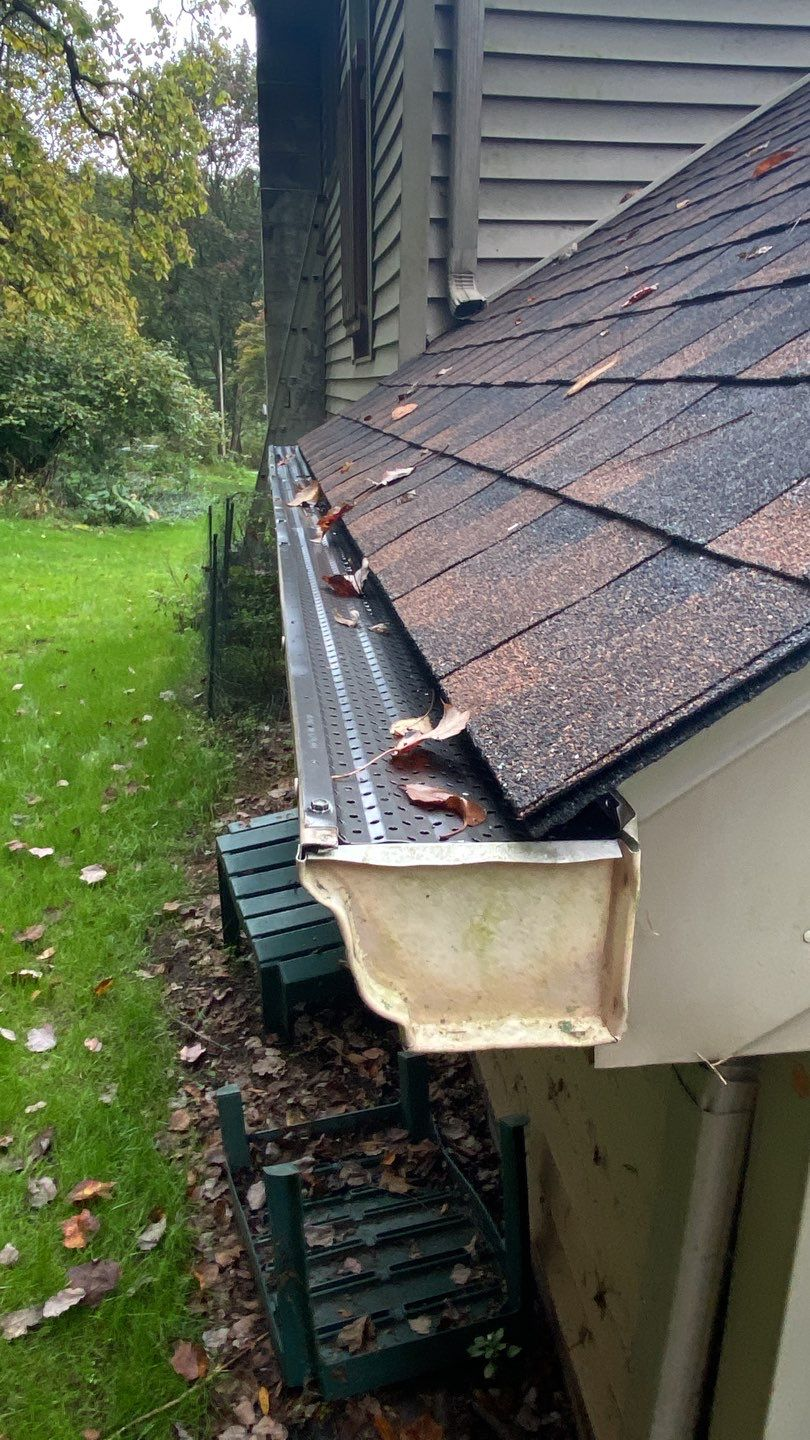Gutter guard system and asphalt shingle roof inspected on Furnace Hill Pike.