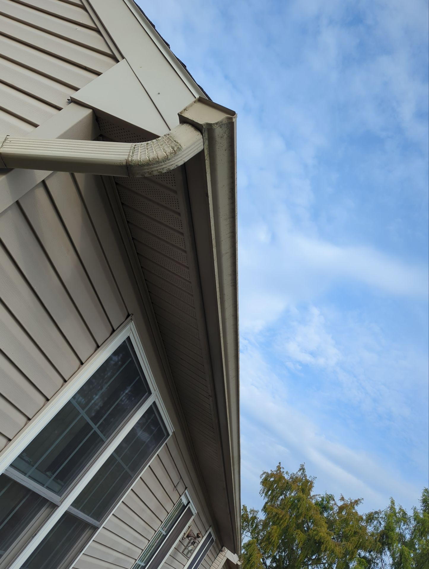 Seamless gutter and downspout inspection on a home on Nittany Drive in Dover, PA to improve roof drainage and water management.