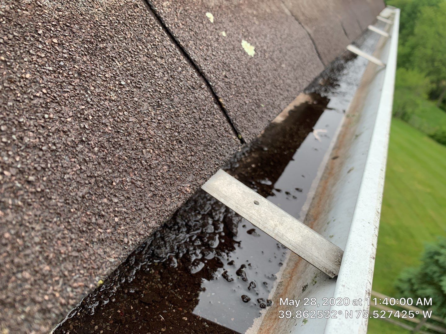 Gutter drainage repair with roof runoff and debris on Edwin Miller Road in Glen Mills PA