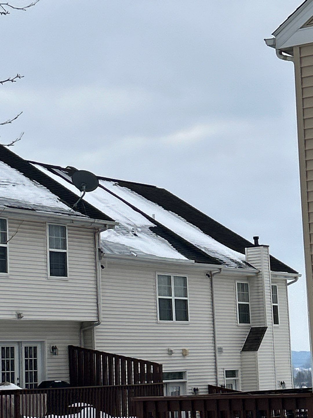 Townhomes with newly installed architectural asphalt shingle roofs on Hampton Court in Morgantown, PA.