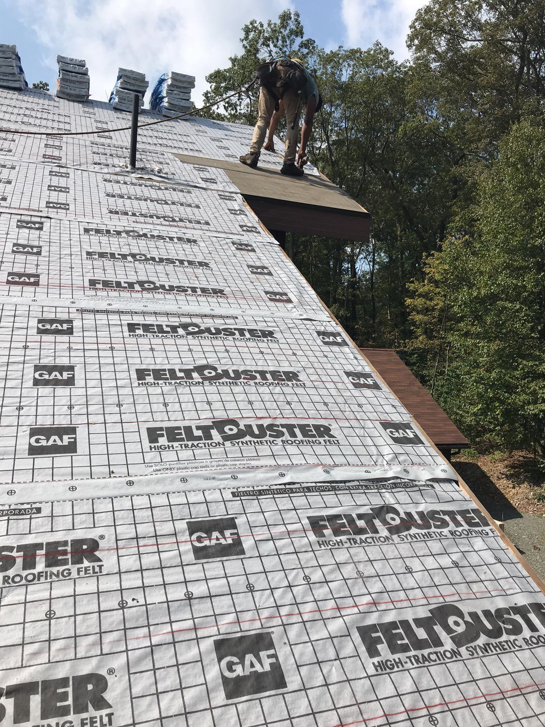 Roof replacement in progress with GAF synthetic underlayment installation on Hawthorne Lane in Boyertown, PA.
