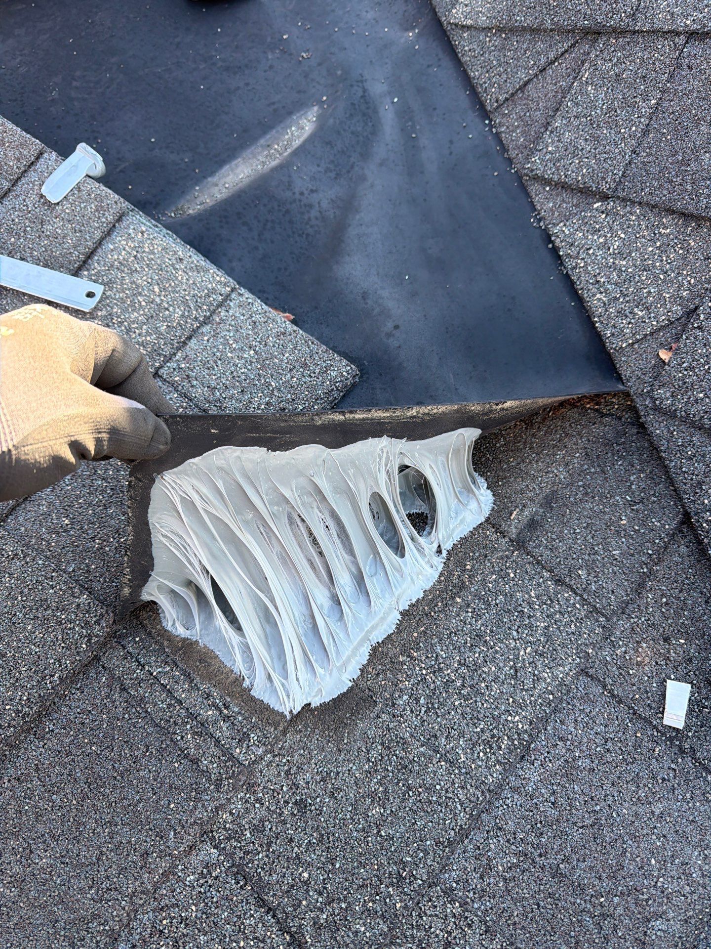 Professional asphalt shingle roof repair in progress on a home on Hillside Drive in Mountville, PA.