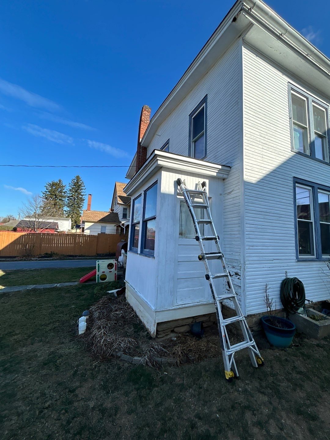 Exterior view of a two-story home on South Market Street in Schaefferstown, PA during a professional roof inspection by Joyland Roofing.