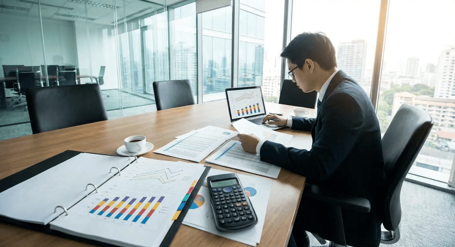 Professional calculating flat roof cost per year to assess long-term roofing value
