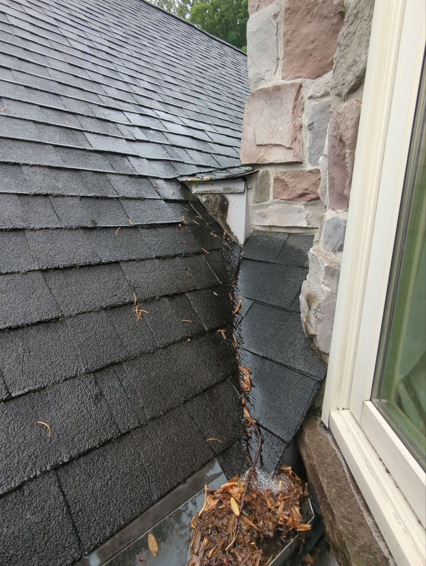 Close-up view of worn and uneven asphalt shingles on a residential roof in York, PA, showing signs of aging and weather-related roofing damage inspected by Joyland Roofing.