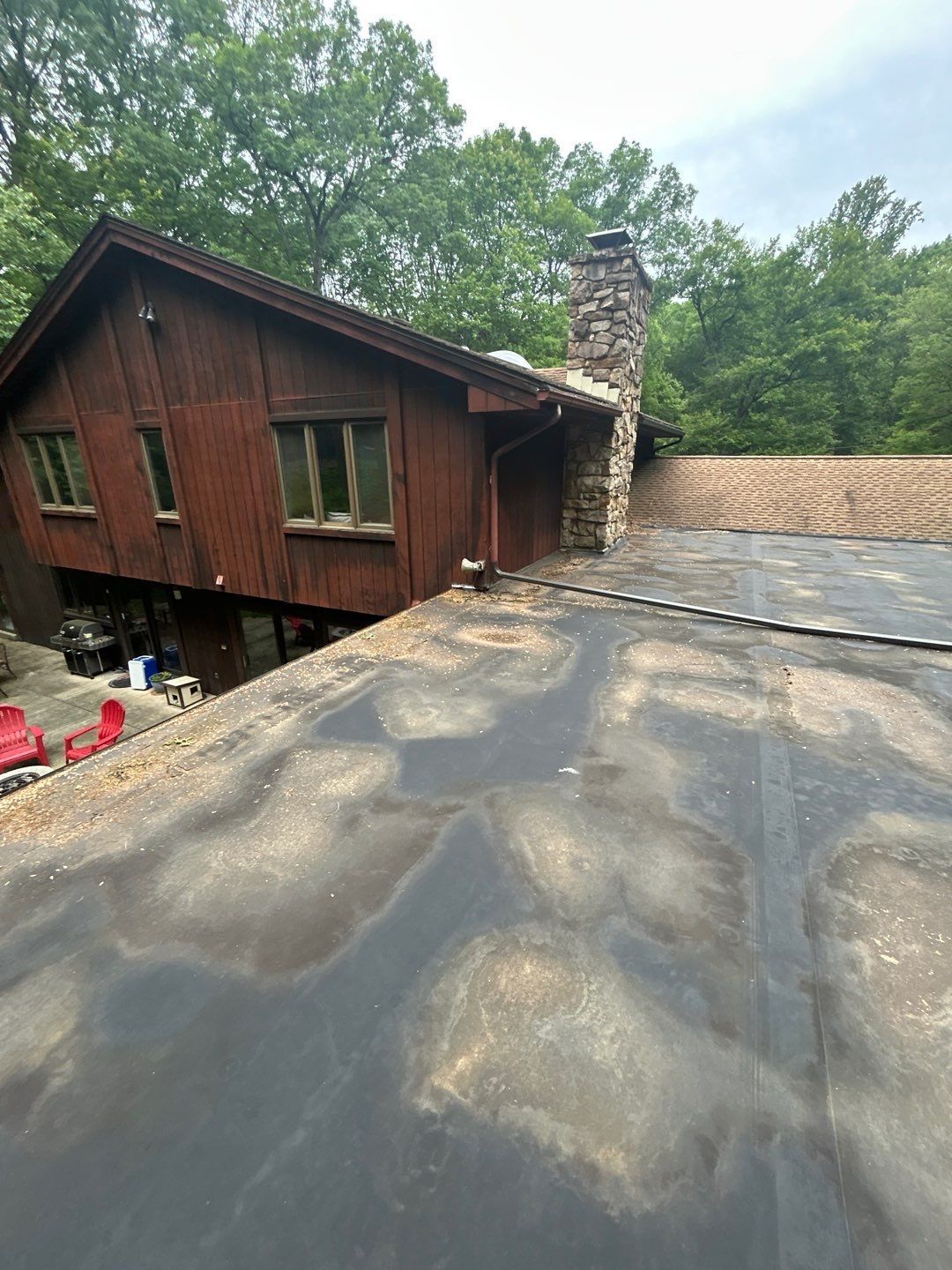 Flat roofing system inspection and repair on a residential home on Lincoln Drive by Joyland Roofing.