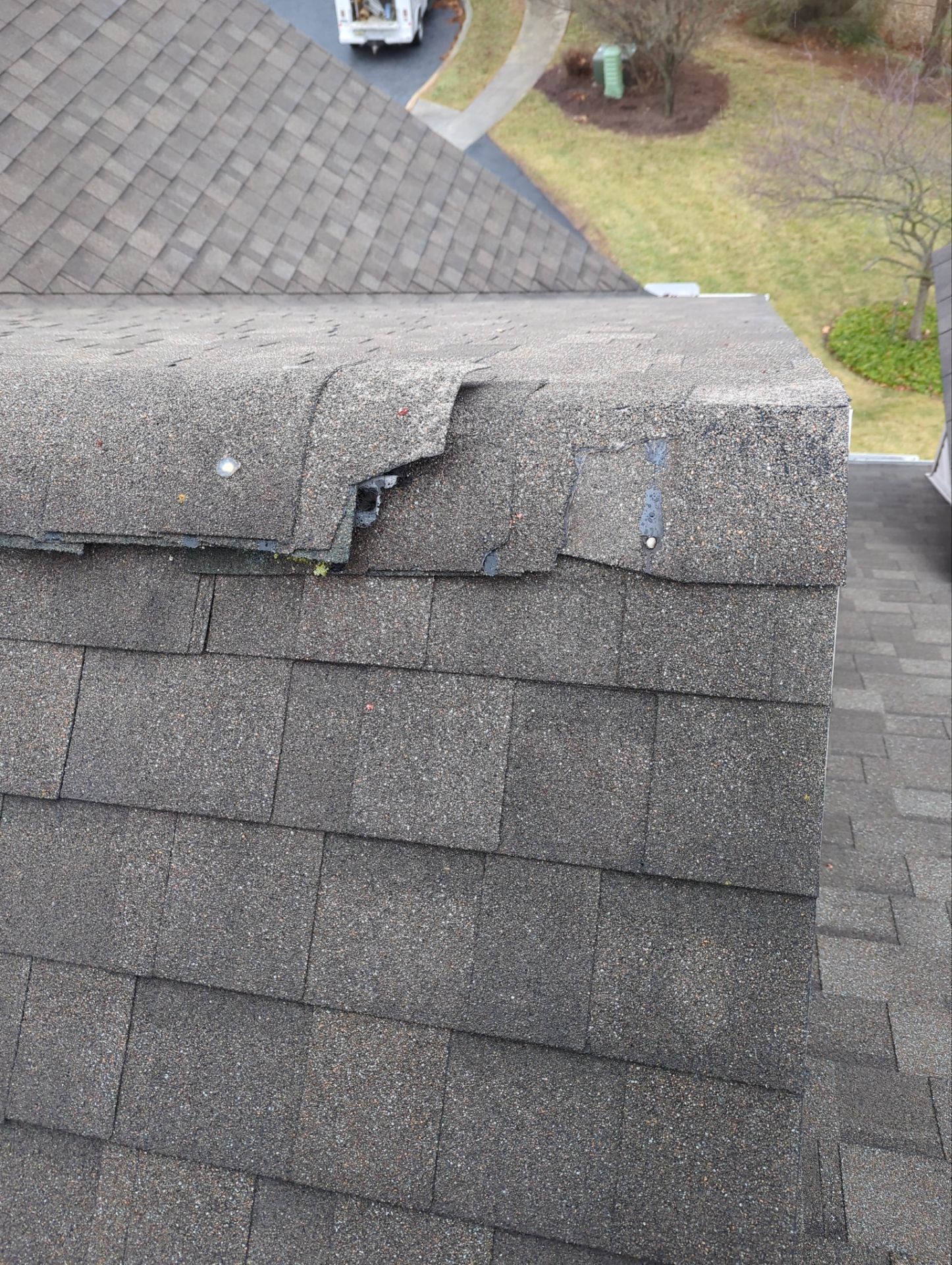 Ridge cap shingle roof repair completed on a home along Loring Court in New Cumberland, PA by Joyland Roofing.
