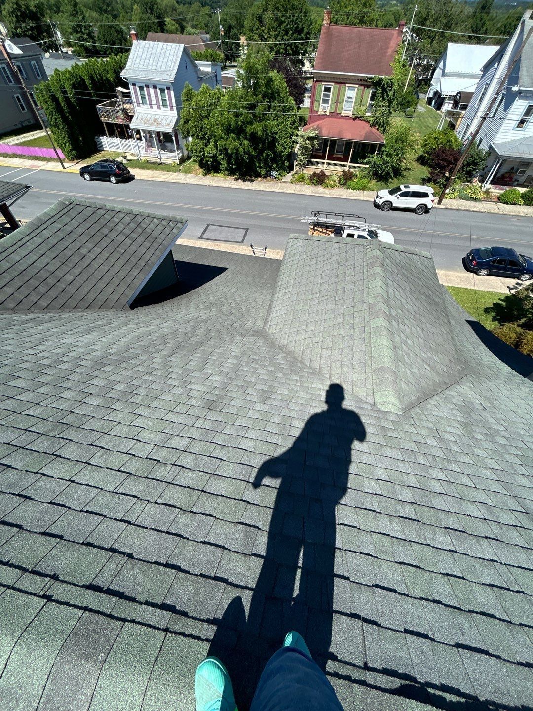 Asphalt shingle roof on Main Street in Shoemakersville, PA inspected by Joyland Roofing, showing multiple roof slopes and valleys.